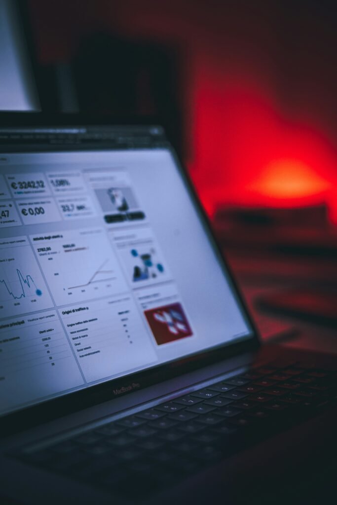 Dark analytics dashboard on a laptop screen – programmatic advertising